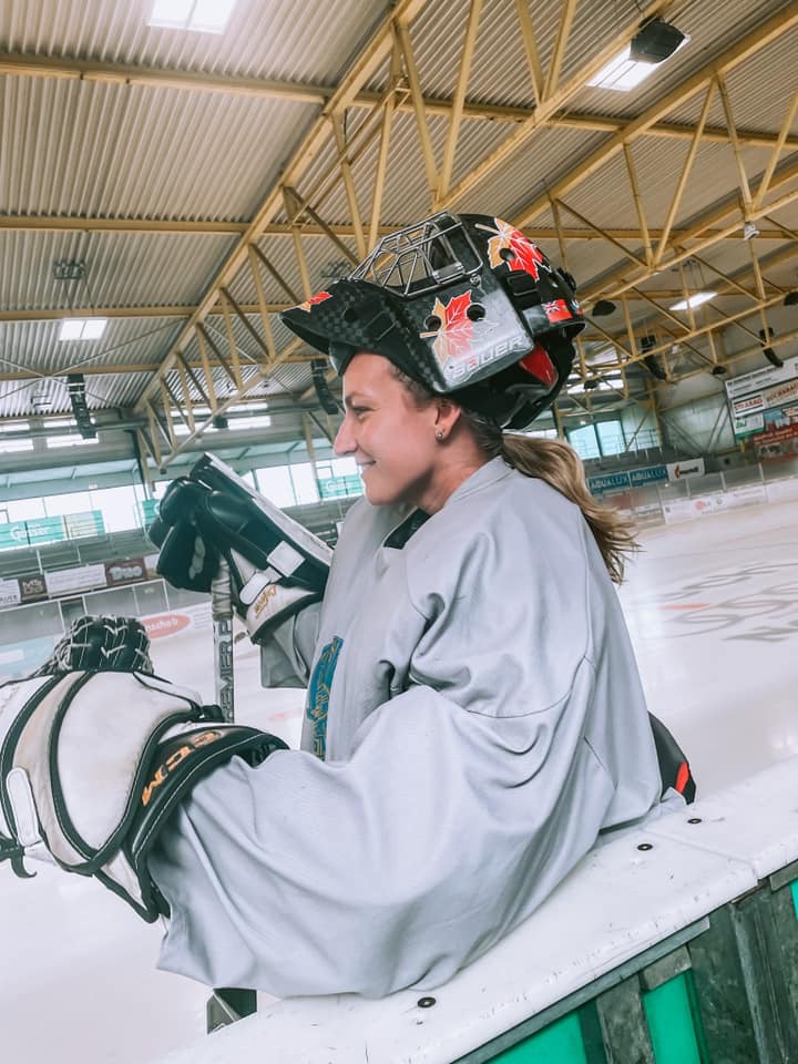 Taylor Cook, photographer and hockey player