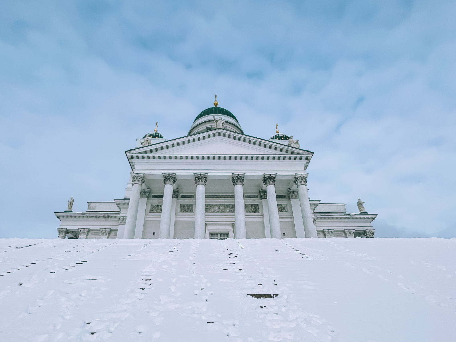Helsinki Cathedral in the snow-covered square in winter.