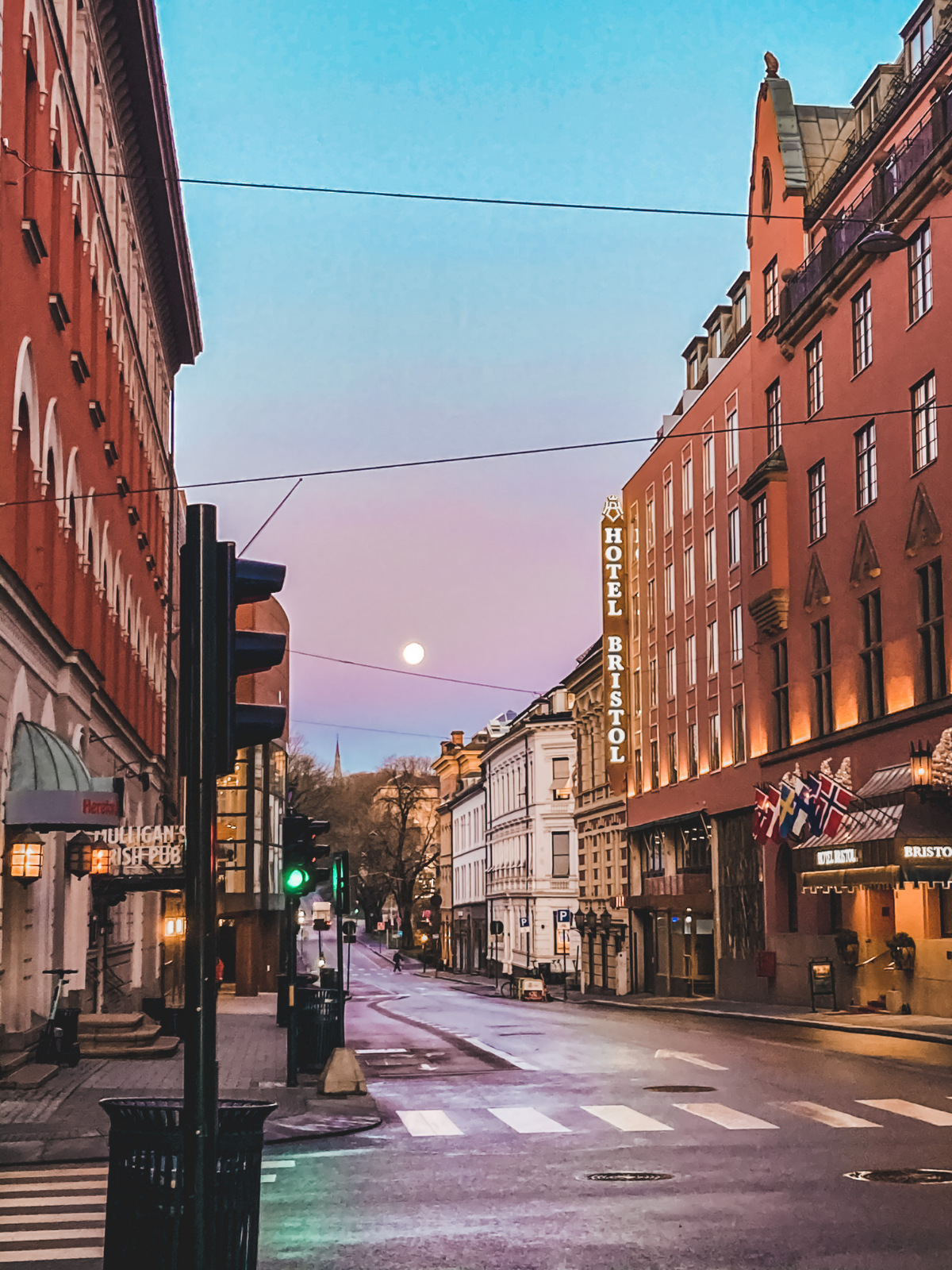 Empty streets of Oslo at dusk.