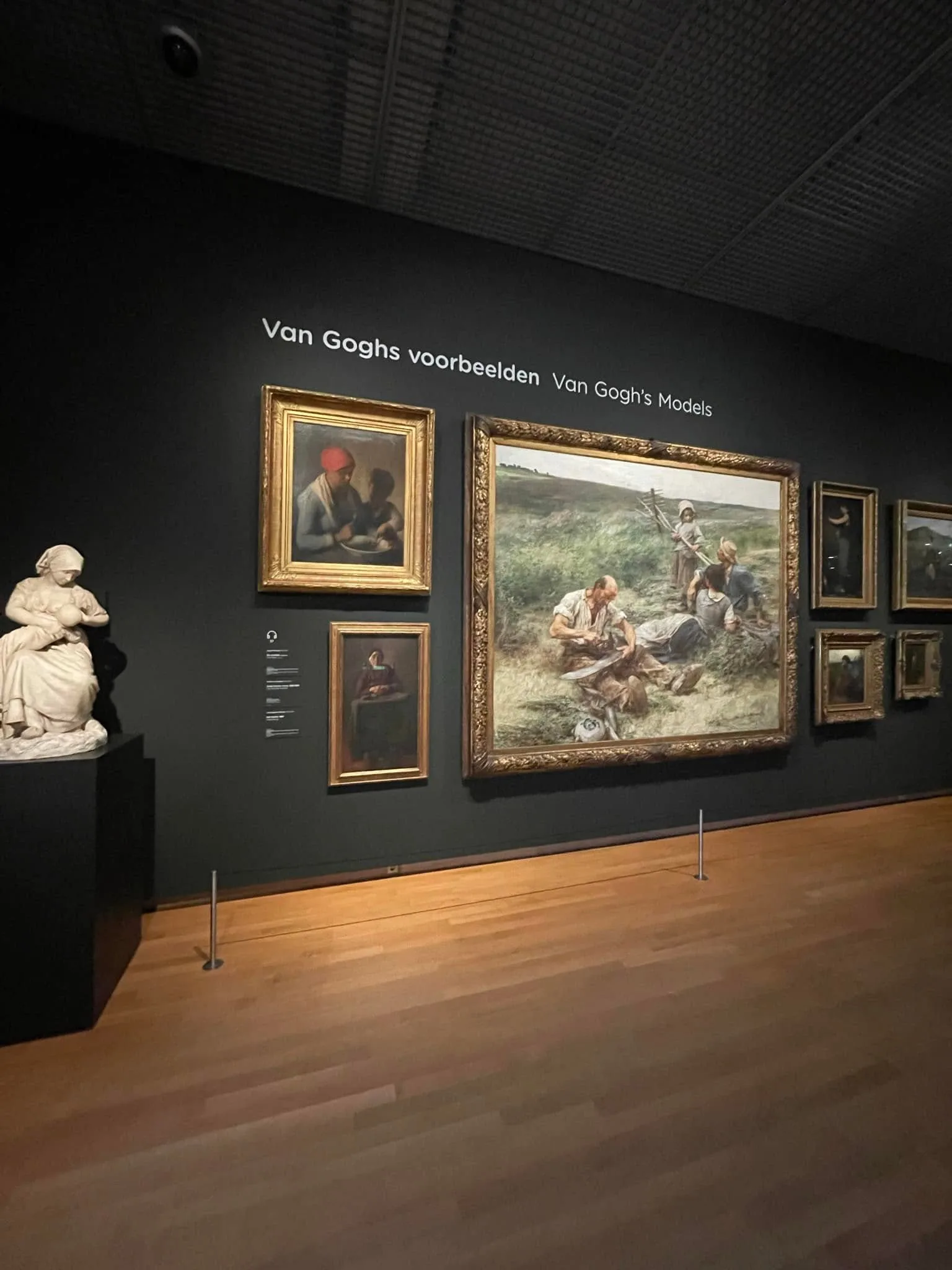 Framed 19th-century paintings in the Van Gogh's Models exhibit